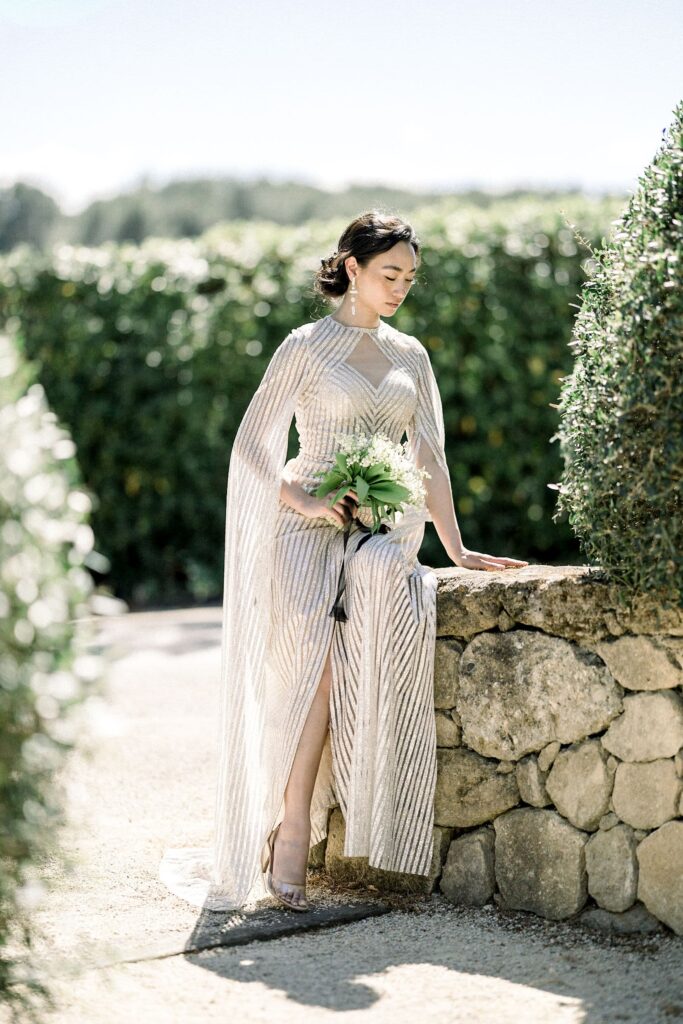 American bride waiting to walk down the aisle in Provence.