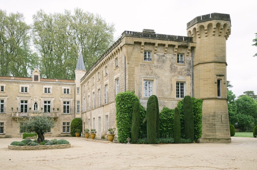 the façade of the Château de Beauregard in the Vaucluse, with its tower resembling that of a chessboard